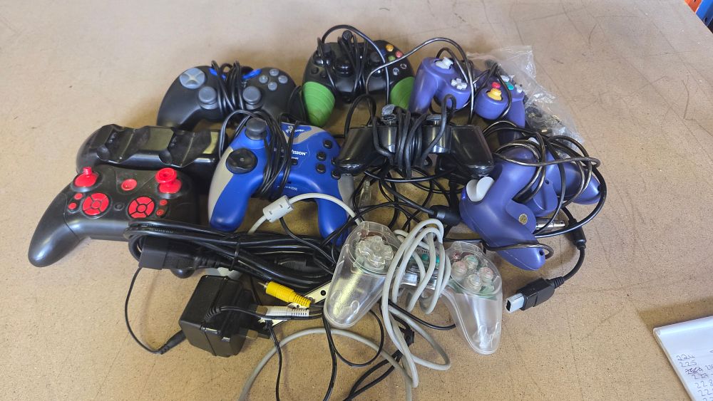 Lot 246 – An Assortment of Video Game Controllers and Accessories for Xbox, PlayStation and GameCube Consoles
