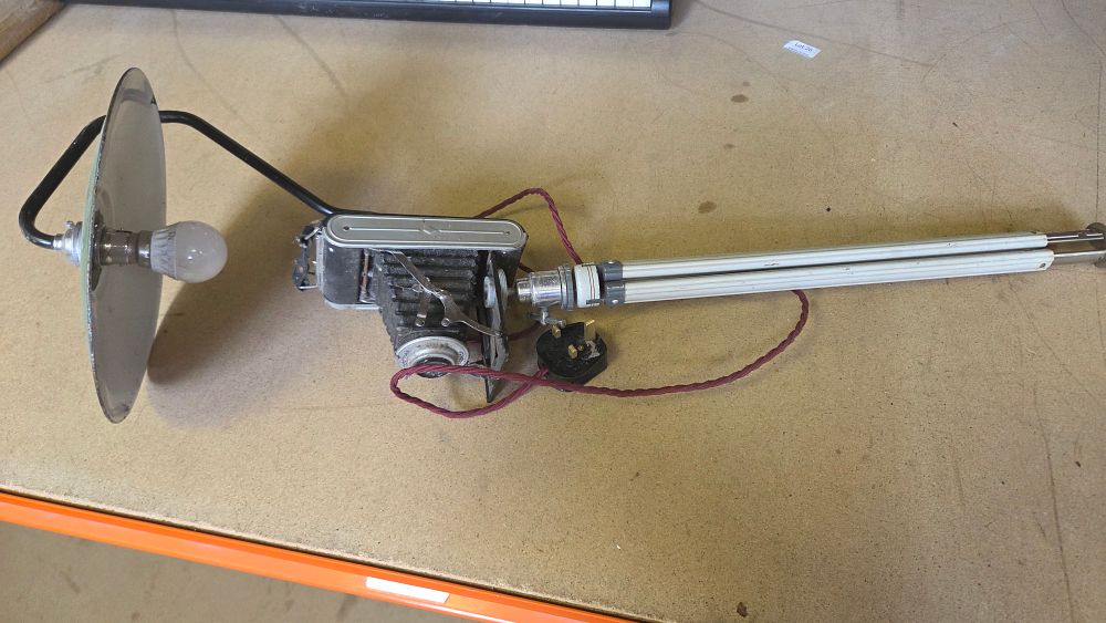 Lot 250 – Industrial Style Table Lamp Repurposed from a Vintage Folding Camera and Tripod