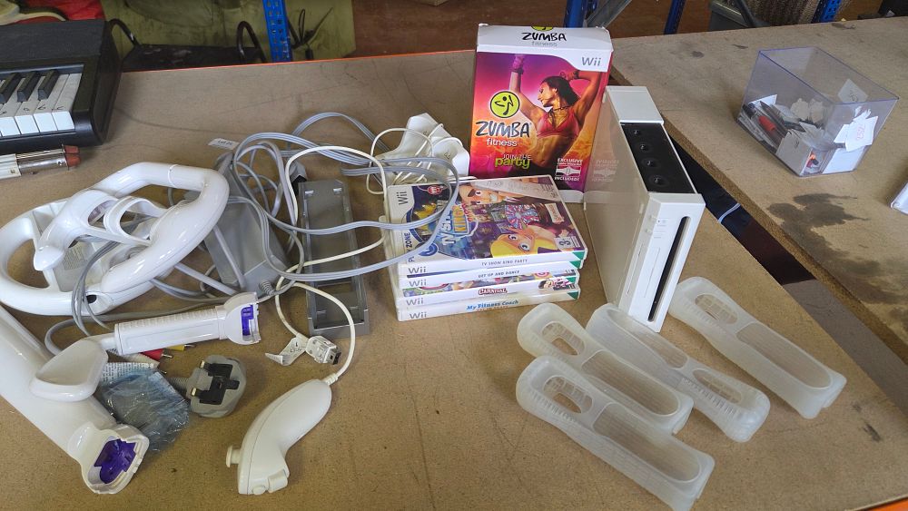 Lot 251 – A Collection of Nintendo Wii Gaming Equipment and Accessories Including Console and Games working order