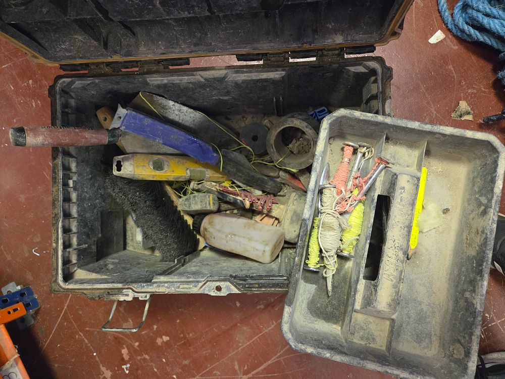 Lot 299 – An Assortment of Masonry and Bricklaying Hand Tools in a Plastic Toolbox