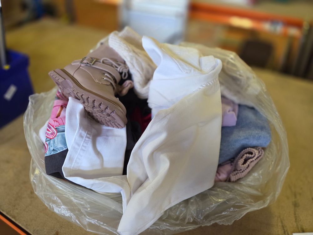Lot 348 – An Assortment of Clothing and Footwear