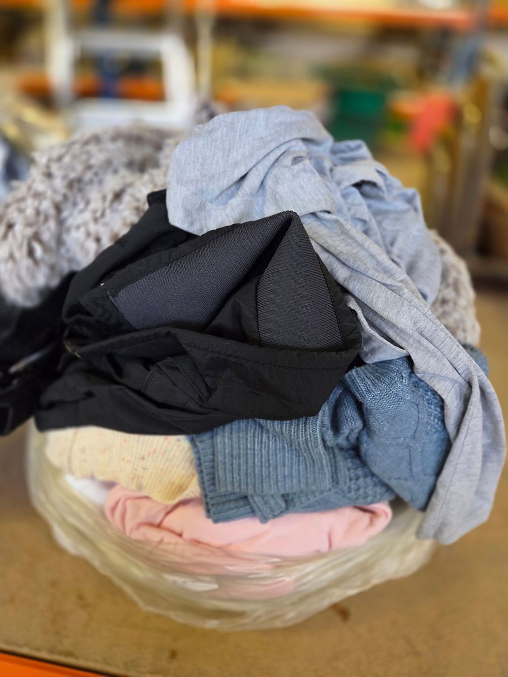 Lot 350 – An Assortment of Mixed Apparel including Knitwear and Jersey Tops