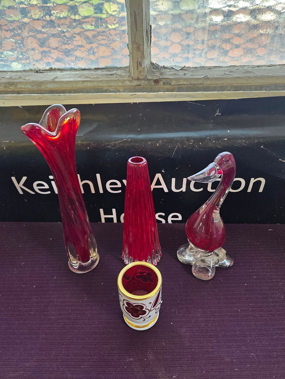 Lot 624 – An Assortment of Ruby and Cranberry Decorative Glass Items