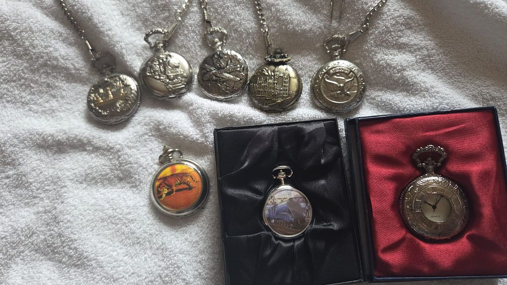 Lot 635 – A Collection of Eight Contemporary Thematic and Commemorative Pocket Watches