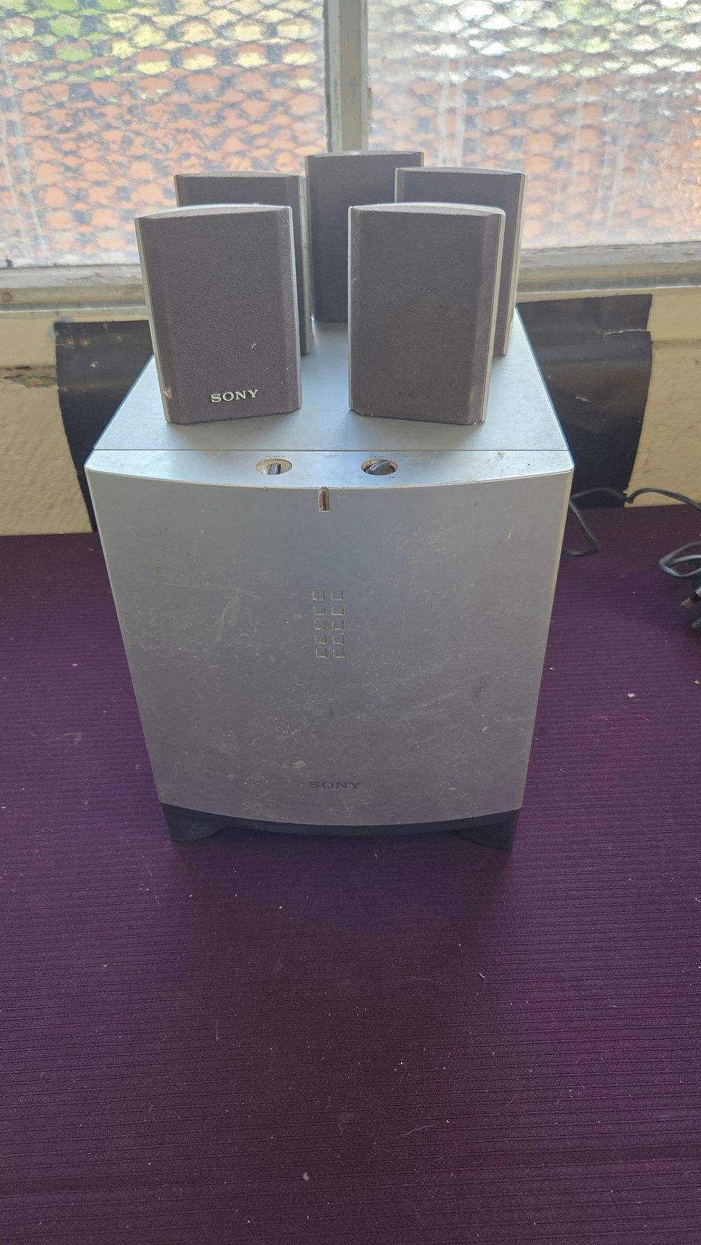 Lot 162 – A Sony Home Theatre Speaker System Comprising an SA-WMS215 Active Subwoofer and Matching SS-MS215 Satellite Speakers powers on