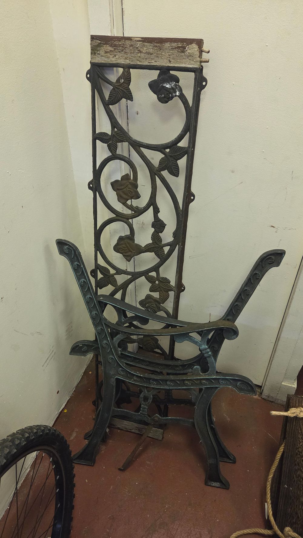 Lot 187 – A Trio of Cast Iron Garden Bench Components in the Rose and Vine Pattern