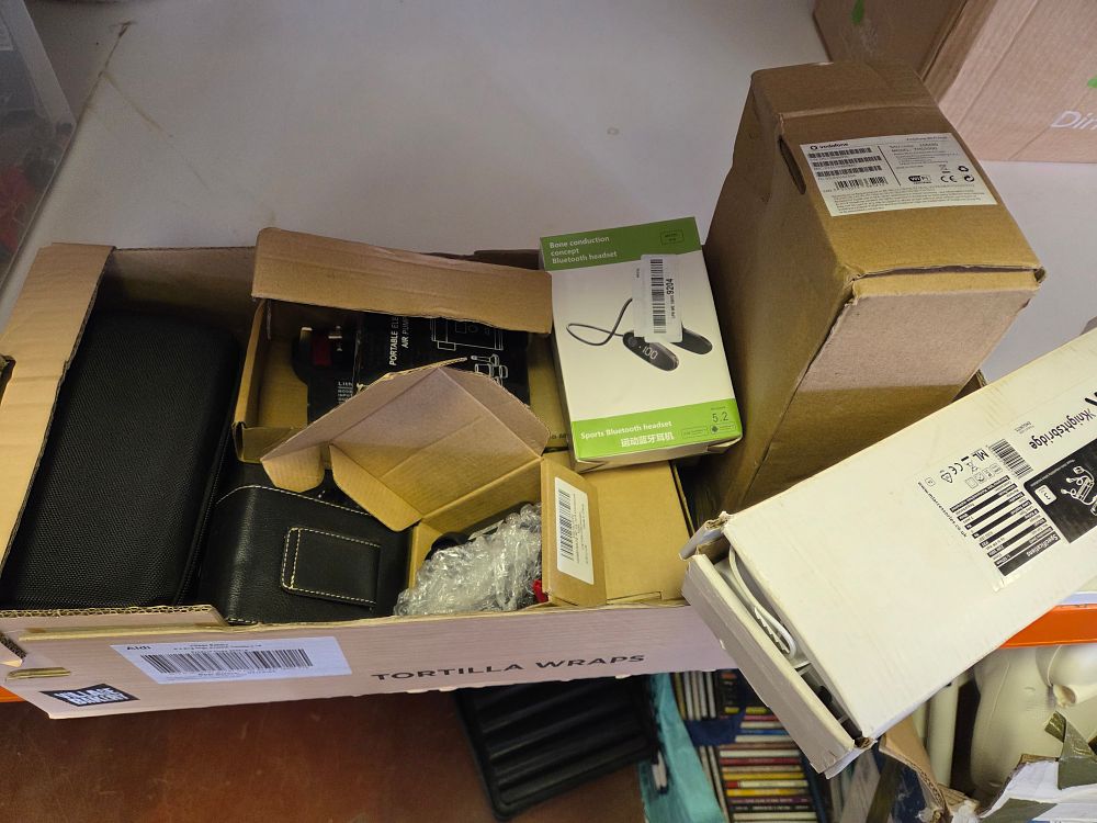 Lot 220 – An Assortment of Consumer Electronics and Accessories including Vodafone Wi-Fi Hub and Bluetooth Headset