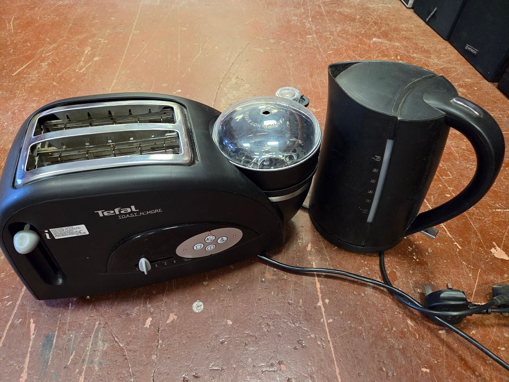 Lot 303 – Two Black Small Kitchen Appliances including a Tefal Toast N’ More Toaster and Egg Maker w/o