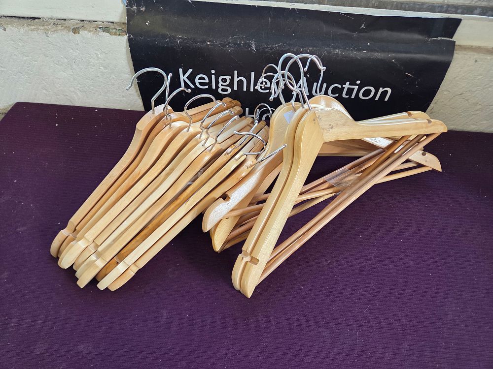 Lot 359 – An Assortment of 20 Natural Finish Wooden Coat Hangers