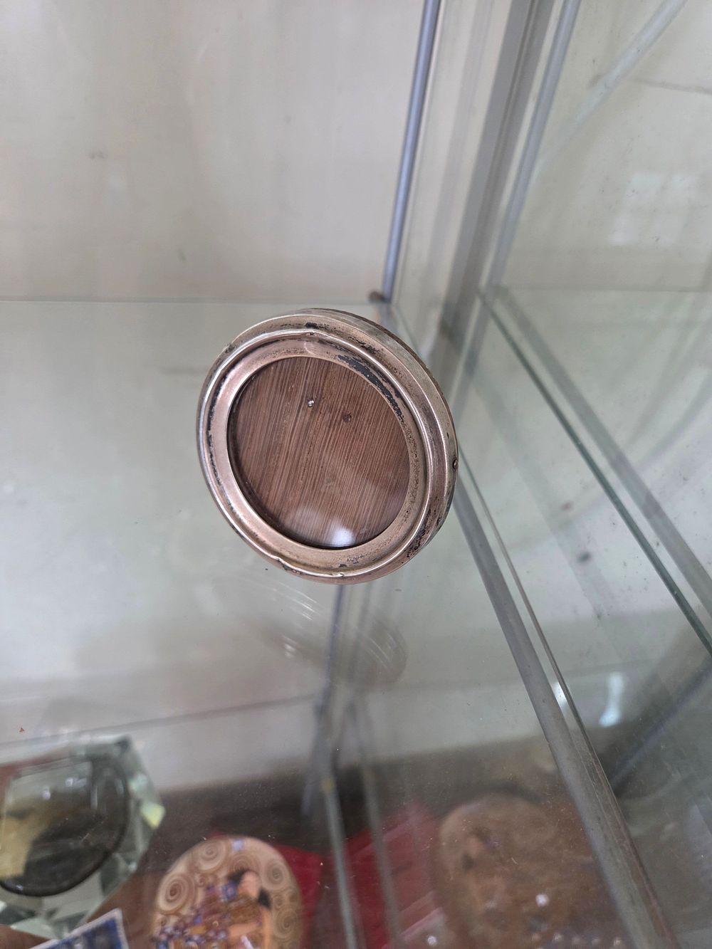 Lot 619 – A Circular Silver 925 Decorative Cabinet Mount