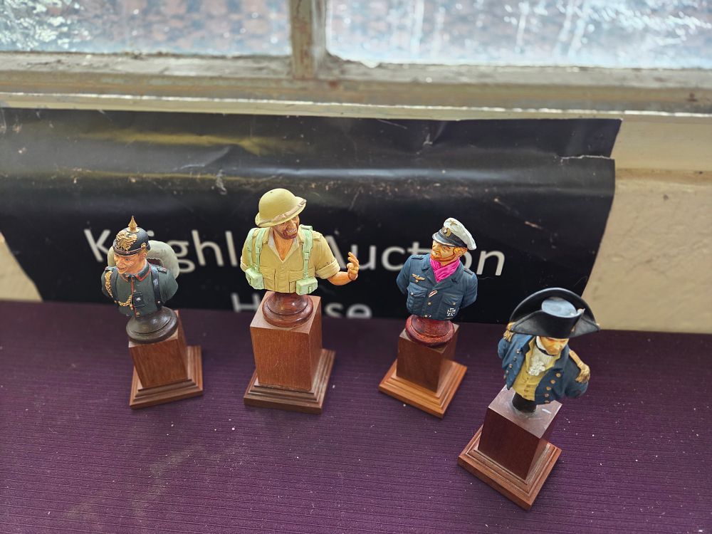 Lot 632 – A Collection of Hand-Painted Military and Historical Character Busts on Wooden Plinths