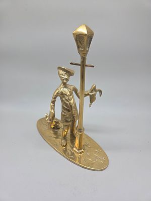 A Vintage Cast Brass Novelty Figurine of a Male Figure Leaning Against a Lamp Post