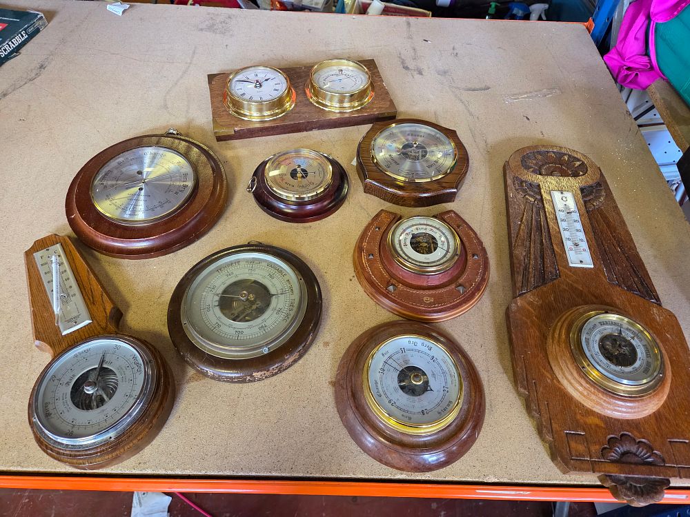 Lot 327 – A Collection of Wall-Mounted and Desk-Top Aneroid Barometers and Timepieces