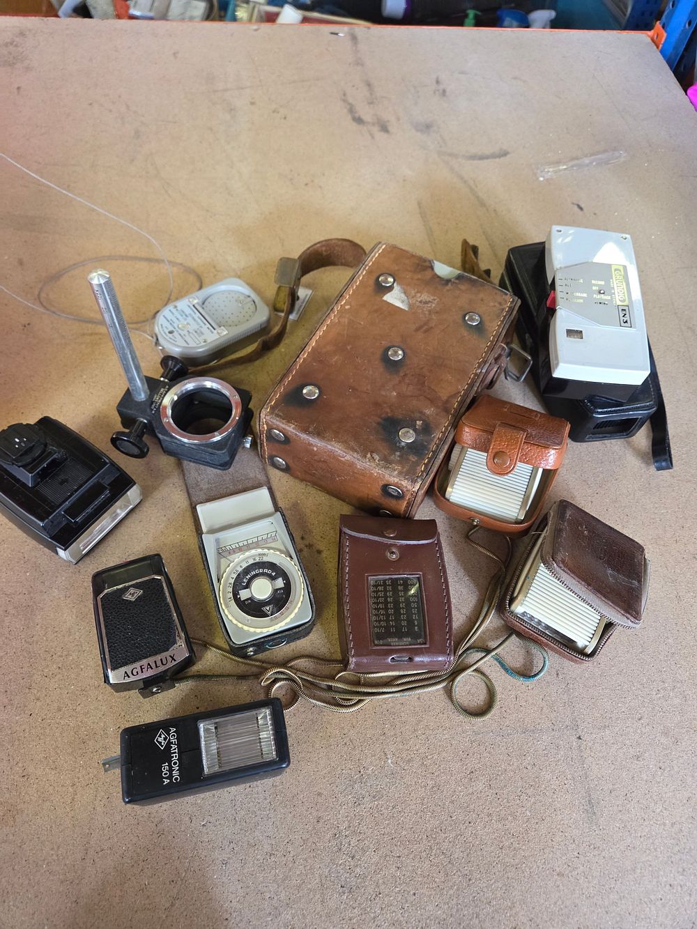 Lot 331 – An Assortment of Vintage Photographic Accessories and Portable Electronics