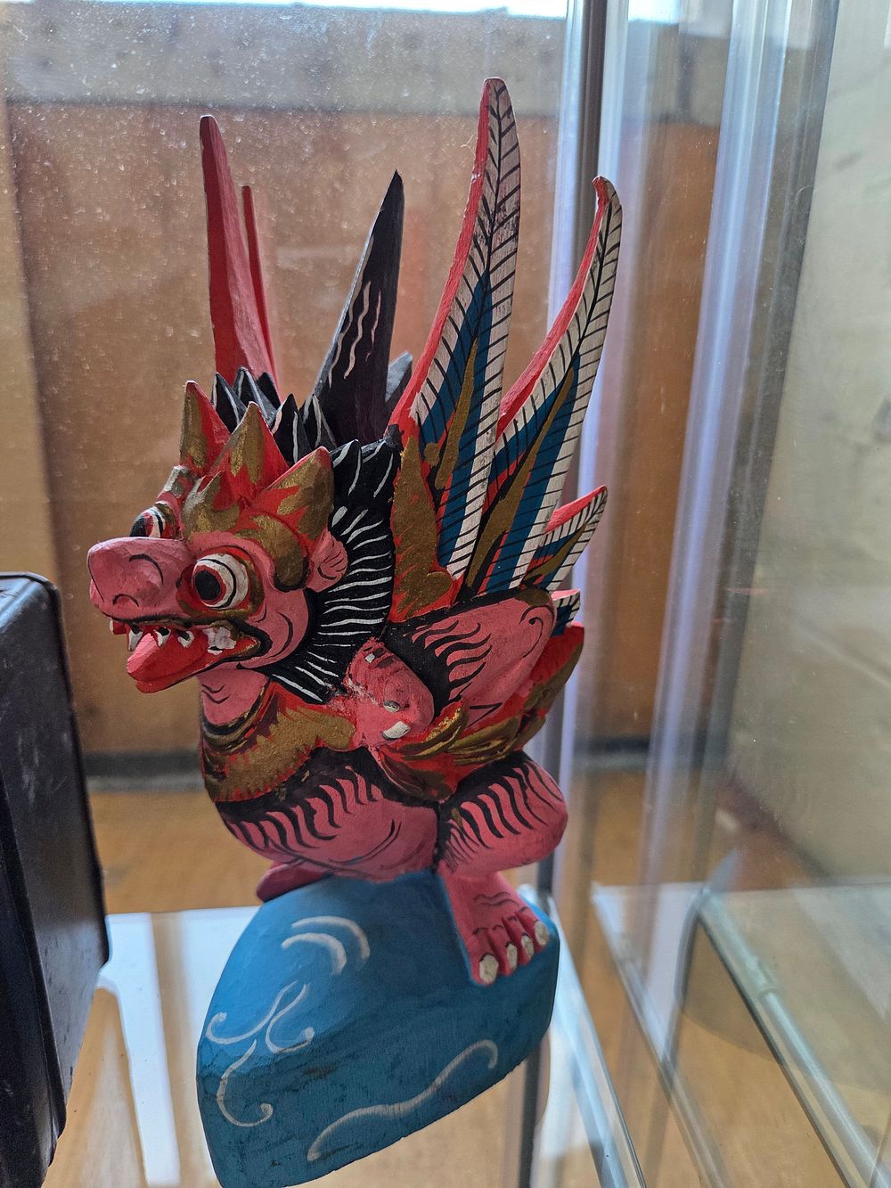 Lot 619 – Balinese Hand-Carved Polychrome Wooden Garuda Statue