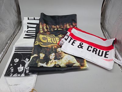 A Trio of M&ouml;tley Cr&uuml;e Fabric Wall Hangings and Banner