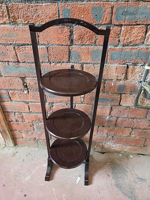 A Bakelite Three-Tier Folding Cake Stand