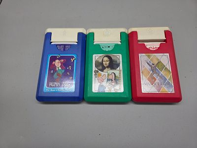 Three Vintage The Games Team Handheld Mini Games