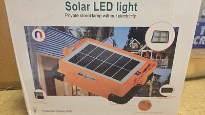 A Portable Solar LED Work Light with 12000mAh Battery and Magnetic Base