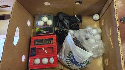 A Collection of Golf Related Gift Sets, Accessories and Used Golf Balls