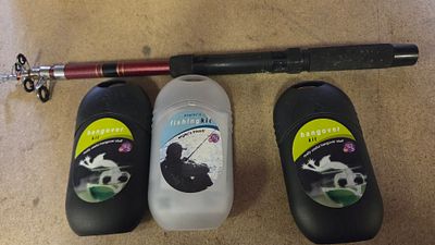 A Collection of Fishing and Novelty Items Including a Telescopic Rod and Gift Kits
