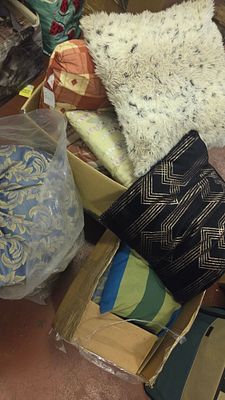 Two Boxes and a Bag of Decorative Cushions and Throw Pillows