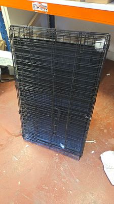 A Large Folding Double-Door Metal Wire Dog Crate