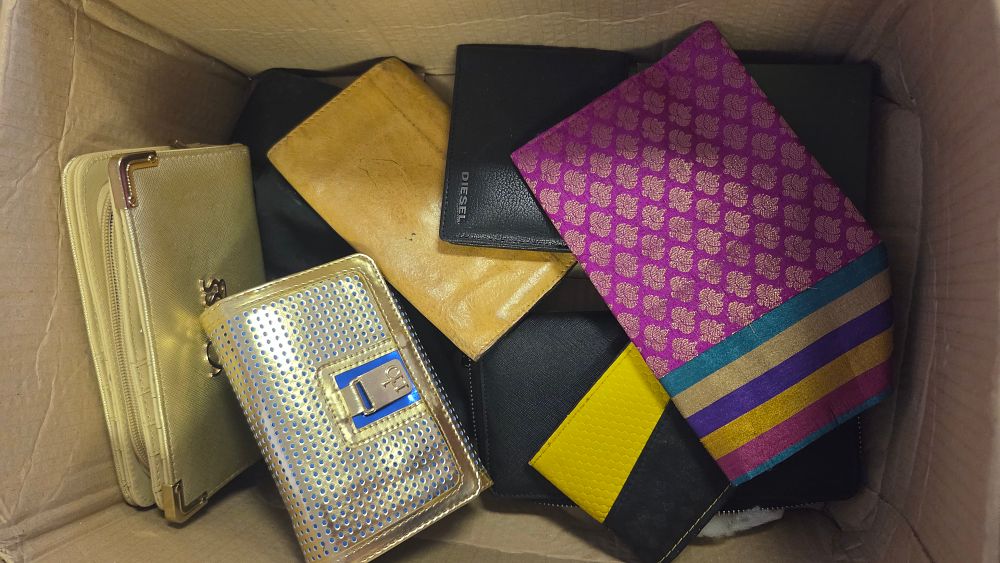Lot 211 – An Assortment of Fashion Wallets Purses and Accessories Including a Diesel Branded Wallet