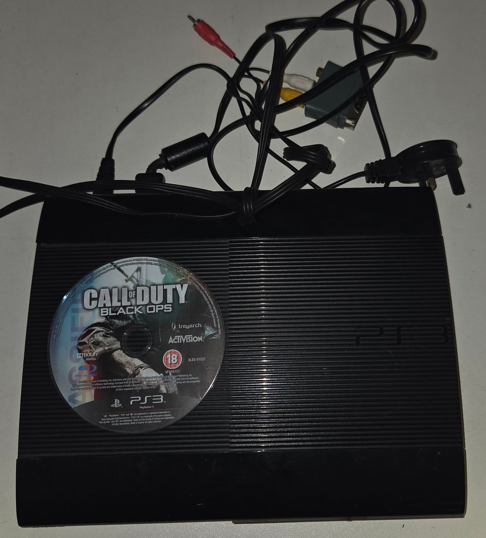 Lot 216 – Sony PlayStation 3 Super Slim Console Model CECH-4203A and an Assortment of Accessories w/o factory reset