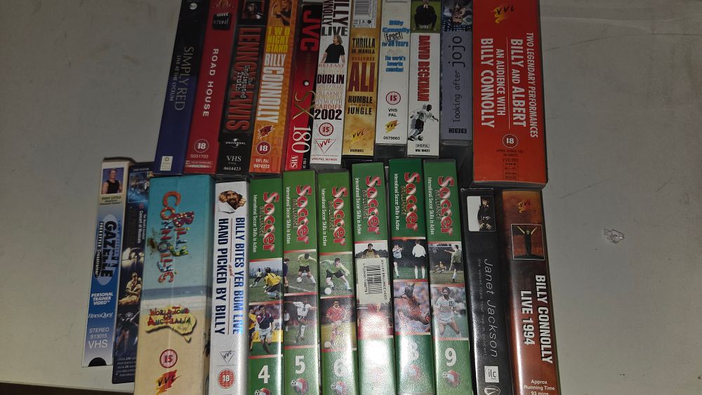 Lot 238 – A Collection of Assorted VHS Tapes featuring Billy Connolly, Sports, and Music
