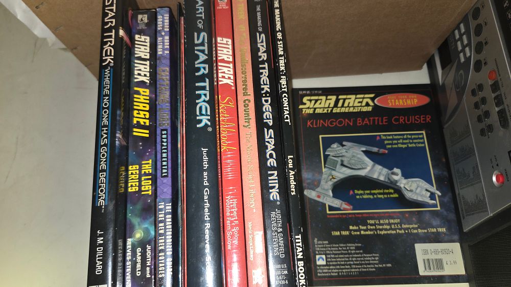 Lot 253 – A Collection of Star Trek Production Reference Books and a Klingon Battle Cruiser Model Kit
