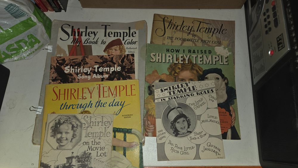 Lot 256 – A Collection of Seven Vintage Shirley Temple Books and Ephemera