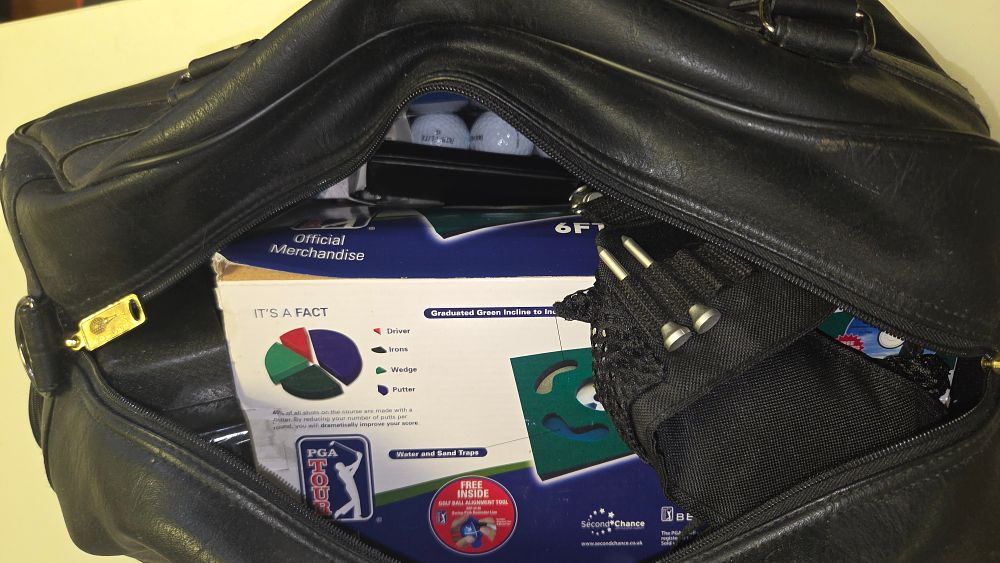 Lot 271 – A Collection of Golf Equipment and Practice Accessories in a Black Holdall