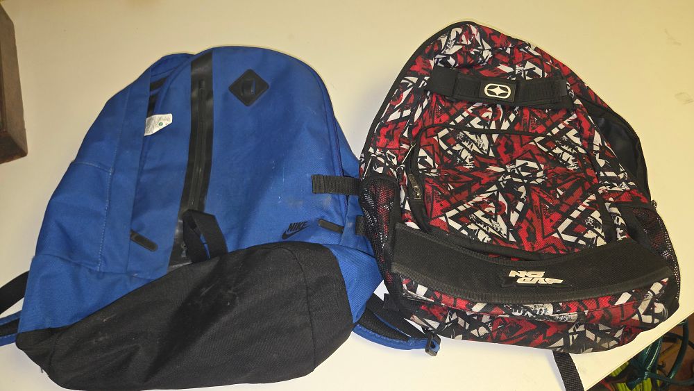Lot 272 – Two Synthetic Fabric Backpacks by Nike and No Fear