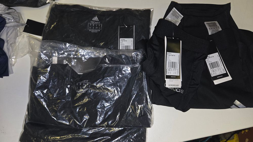Lot 291 – Four New Adidas Men’s Athletic Compression Tops and Shorts Various Sizes