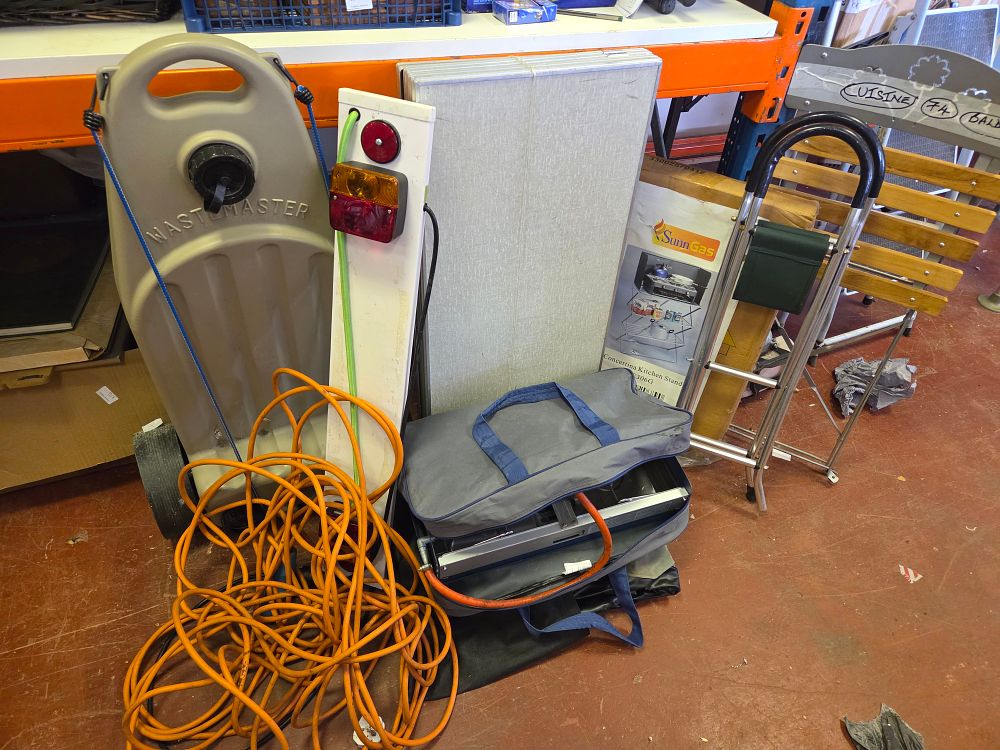 Lot 318 – An Assortment of Caravan and Camping Equipment including a Wastemaster Water Carrier and SunnGas Kitchen Stand