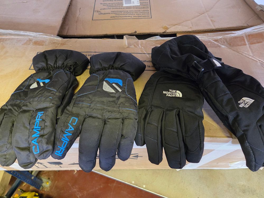Lot 327 – Two Pairs of Insulated Winter Gloves by Campri and The North Face