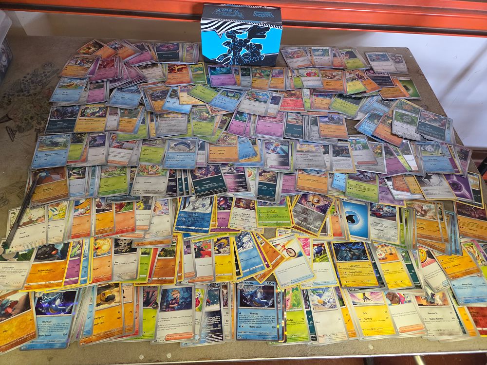 Lot 334 – A Collection of Pokémon Trading Cards from the Scarlet & Violet Series with a Temporal Forces Elite Trainer Box