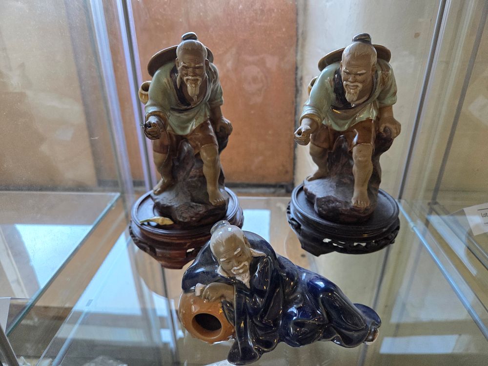 Lot 657 – A Trio of Chinese Shiwan Style Glazed Stoneware Figures
