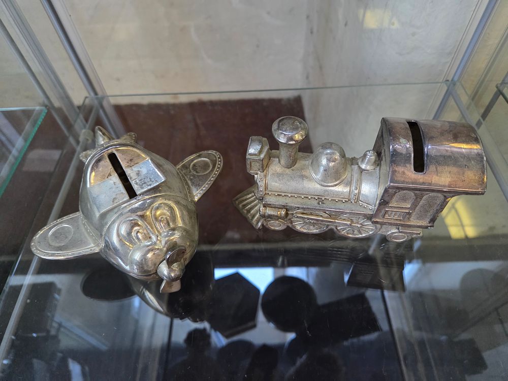 Lot 658 – Two Vintage Silver Plated Novelty Still Banks