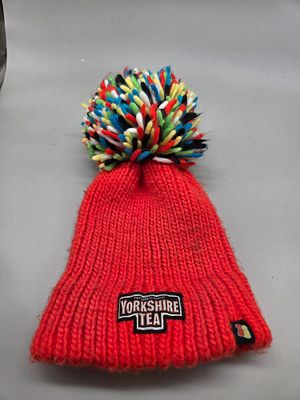 2019 UCI Road World Championships Yorkshire Tea Knitted Bobble Hat. A bright red chunky-knit 