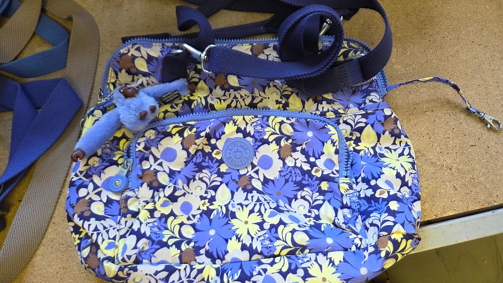 Lot 198 – A Kipling Floral Print Crinkled Nylon Cross-Body Bag with Keychain