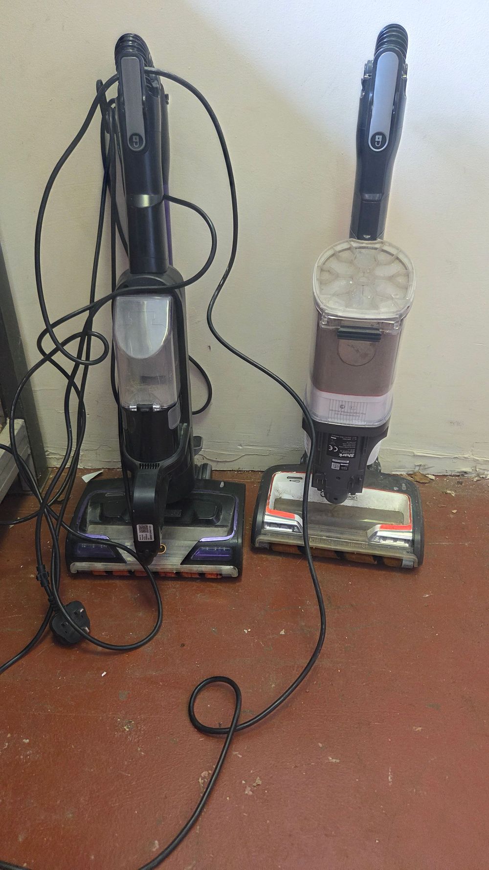 Lot 207 – Two Shark Corded Upright Vacuum Cleaners (purple one powers on)