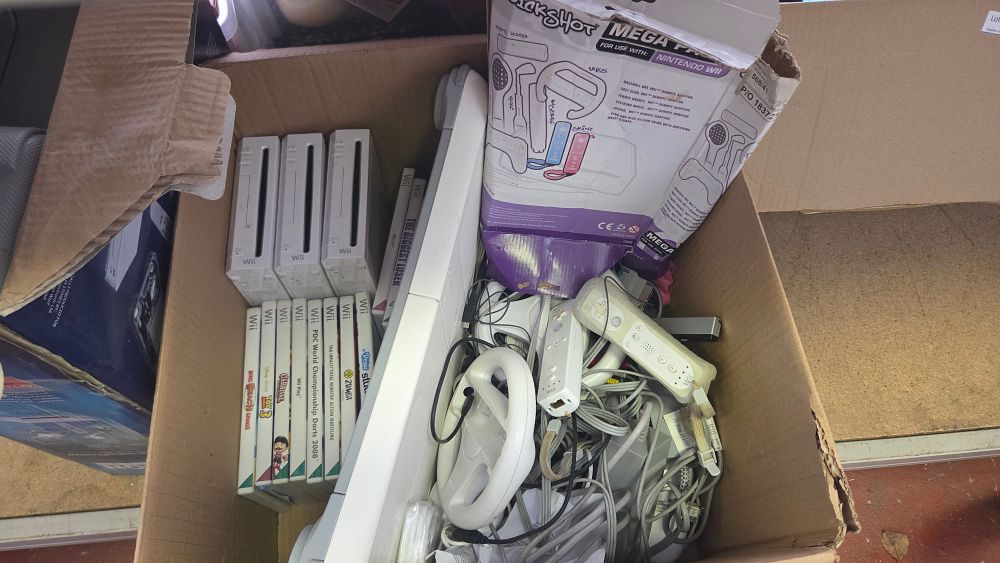 Lot 216 – Three Nintendo Wii Gaming Consoles and Accessories including Balance Board and Games