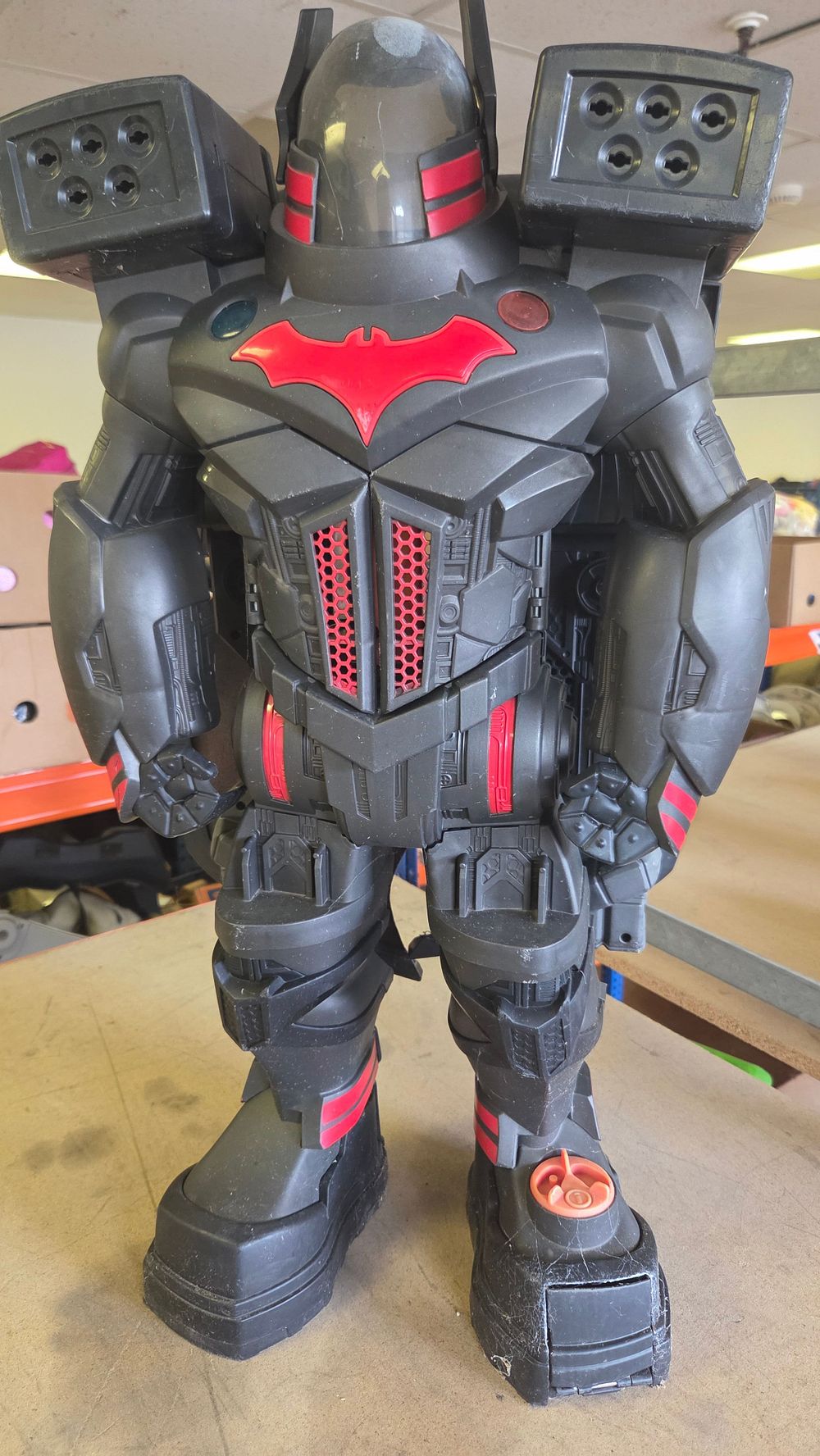 Lot 248 – A large-scale Batman-themed black and red transforming robot action figure and playset