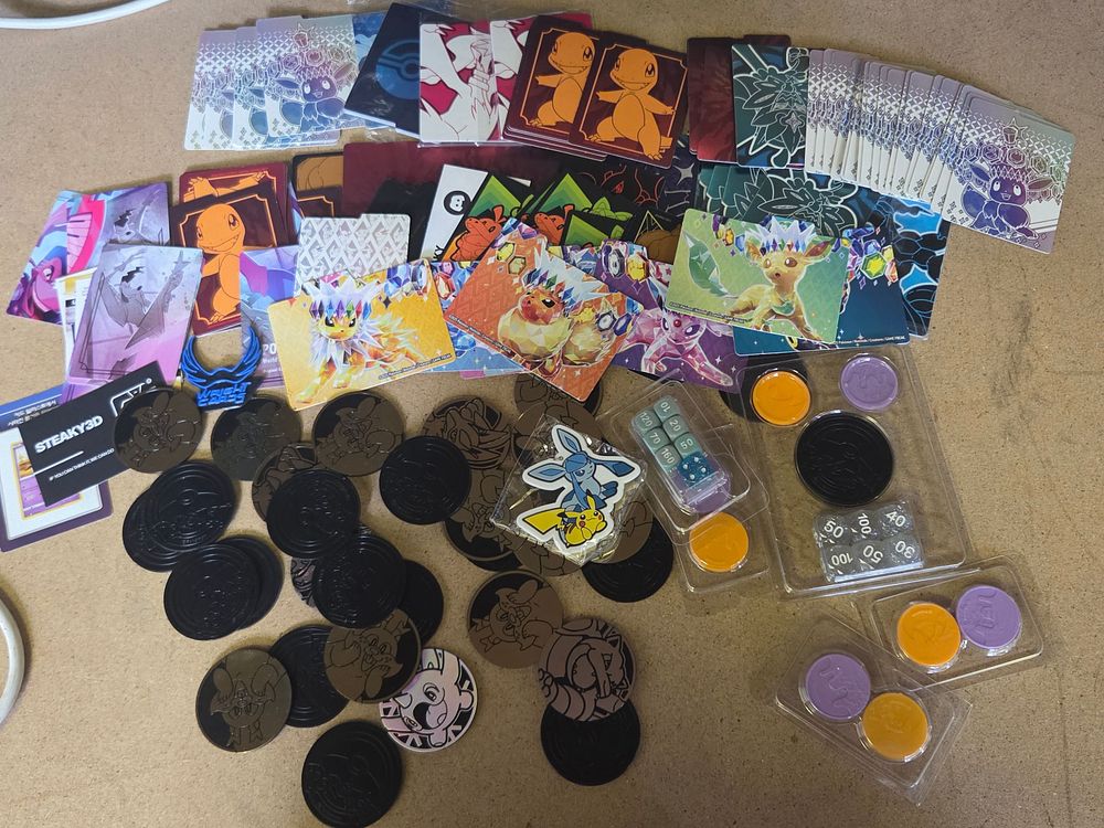 Lot 261 – An Assortment of Official Pokémon TCG Gameplay Accessories and Ephemera
