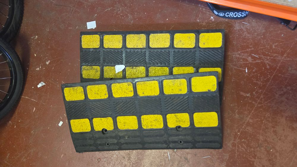 Lot 275 – A Pair of Heavy-Duty Rubber Kerb Ramps with High-Visibility Inserts