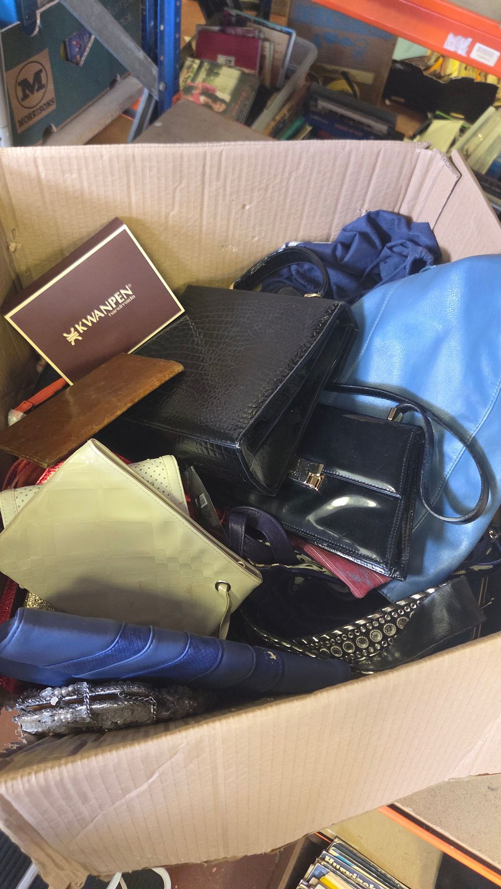 Lot 284 – An Assortment of Women’s Handbags, Clutches, and Purses including a Boxed Kwanpen Item