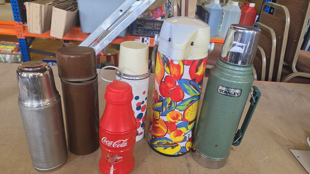Lot 336 – A Collection of Vintage Thermoses and Liquid Containers Including Aladdin Stanley and Coca-Cola Examples