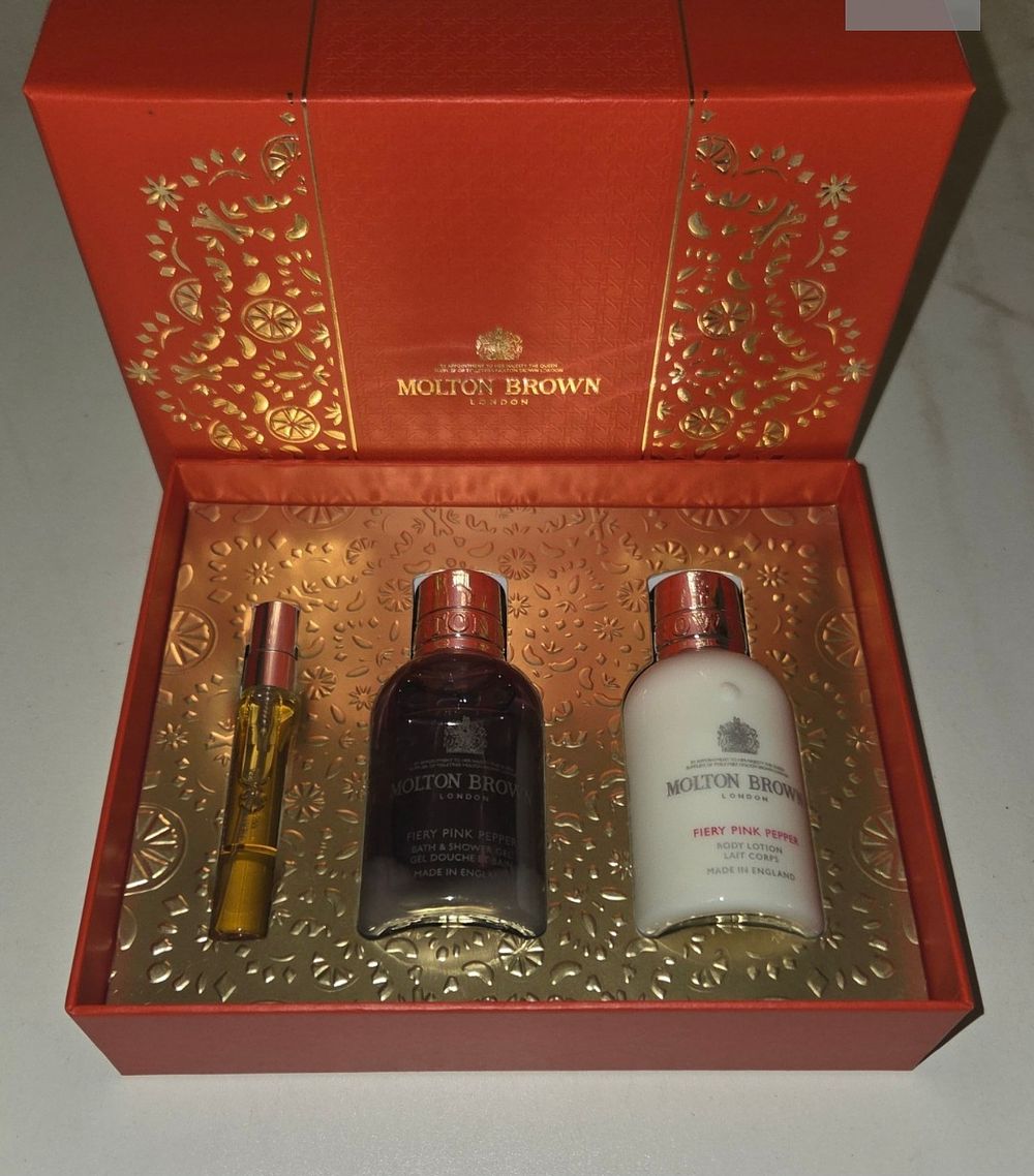 Lot 399 – Molton Brown Fiery Pink Pepper Three-Piece Personal Care Gift Set